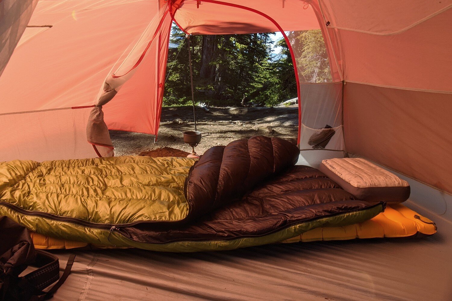 A backpacking sleep system inside a backpacking tent