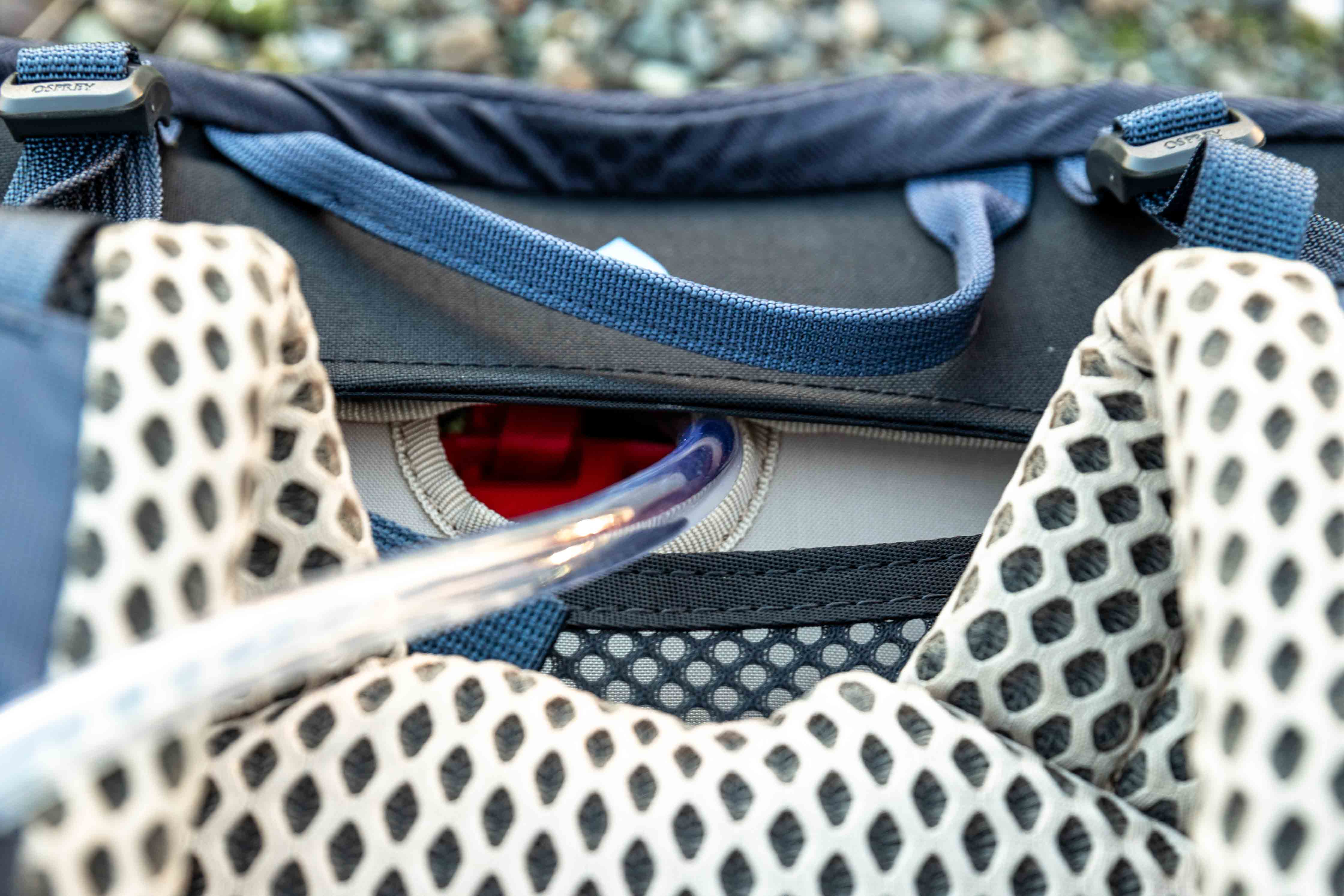 Details of Osprey Mira 22 - the hydration hose comes out of the pack from the center back between the shoulders