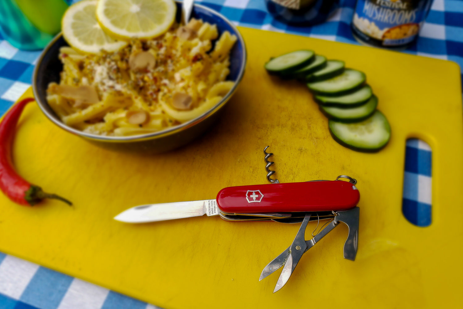 The-Victorinox-Swiss-Army-Huntsman-knife-on-a-cutting-board-with-food
